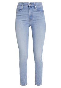Jeans alta vita di colore azzurro chiaro con vestibilità slim, realizzati in denim. Presentano un design con cinque tasche standard e una leggera scoloritura lungo le gambe.