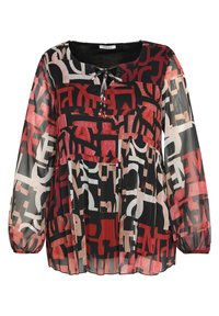 Blouse transparente à manches longues avec motif abstrait en blocs rouge, noir et beige, col rond et lien avec pompons en perles à l'avant.