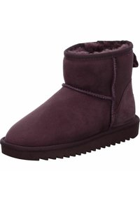 Stivaletto alla caviglia in suede viola con una morbida foderatura pelosa, punta arrotondata e suola in gomma texturizzata con un motivo a zigzag.