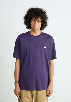 Purple cotton T-shirt with short sleeves and a round neckline. Features a small white logo on the chest. Smooth texture, casual fit.
