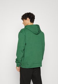 Market EURO STYLE HOODIE UNISEX - Camisola - washed forest green