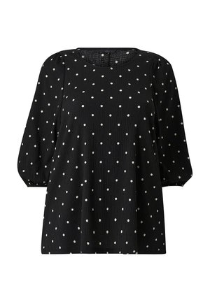 Blusa negra con lunares blancos, cuello redondo, mangas abullonadas de 3/4 y una tela texturizada para mayor dimensión. Diseño holgado.