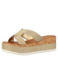 Béžové platformové sandály s křížovými tkanými pásky, střední podrážkou podobnou korku a texturovanými jutovými detaily podél okraje. Bílá gumová podrážka.