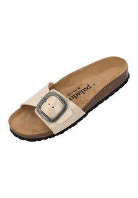 Beige slide sandal with a wide strap featuring a large metallic buckle, cork footbed, and black rubber outsole. Slight texture on the strap.