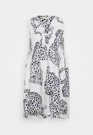 Sleeveless dress in white fabric, featuring a black and blue leopard print design. Loose fit with a round neckline and fluttering hem.