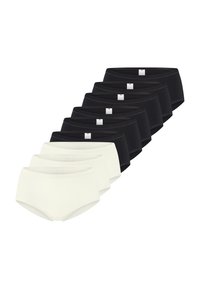 Pakke med otte sømløse undertøj: fire sorte og fire hvide, med en glat tekstur og elastisk taljebånd med et minimalt logo-tag.