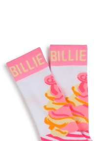 Chaussettes blanches avec du texte "BILLIE" en rose et jaune et un design de cornet de glace. Caractéristiques de tourbillons et de rayures colorées au niveau de l'ourlet. Matériau doux.