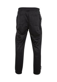 Black athletic pants with an elastic waistband, two back pockets, and white side stripes. The fabric appears smooth and lightweight.