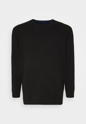 Sweat-shirt en coton noir à col ras du cou avec des manches longues et des poignets côtelés. Présente un logo subtil sur la poitrine et une texture lisse et unie.