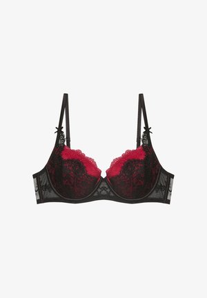 Soutien-gorge en dentelle noire avec des accents en dentelle florale rouge sur les bonnets, bretelles réglables et bande en mesh. Dispose d'armatures pour un soutien.