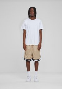 Urban Classics STRIPES  - Jogginghose - unionbeige black white