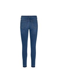 Jeans ajustados en denim azul oscuro con tiro medio, que cuentan con cinco bolsillos, costuras decorativas y una textura suave y elástica.