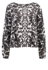 Blusa stampata in bianco e nero con maniche lunghe, caratterizzata da un collo rotondo e dettagli arricciati sui lati, realizzata in un tessuto leggero e liscio.