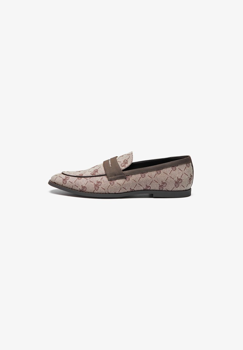 Loafers made of textured beige fabric with a brown accent strap. Features a subtle pattern and a flat black sole.