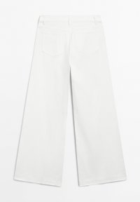 FLARED HIGH-WAIST - Jeans a zampa - white