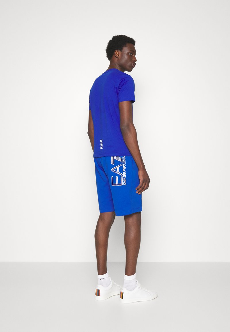 Herren Trainingsanzüge | EA7 Emporio Armani BERMUDA Jogginghose royal blue/royal - CV73842 Herren Trainingsanzüge | EA7 Emporio Armani BERMUDA Jogginghose royal blue/royal - CV73842