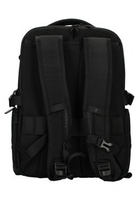 Zaino nero con spallacci imbottiti, texture a rete, fibbie regolabili e manico superiore. Scomparto principale con zip nella parte superiore.