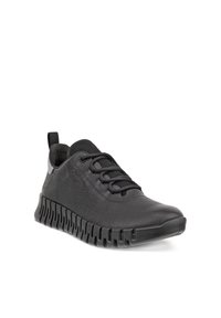 Sort lædersneaker til casual brug med struktureret sål, snørebånd foran og trækstrop ved hælen, vist i en let vinkel på hvid baggrund.