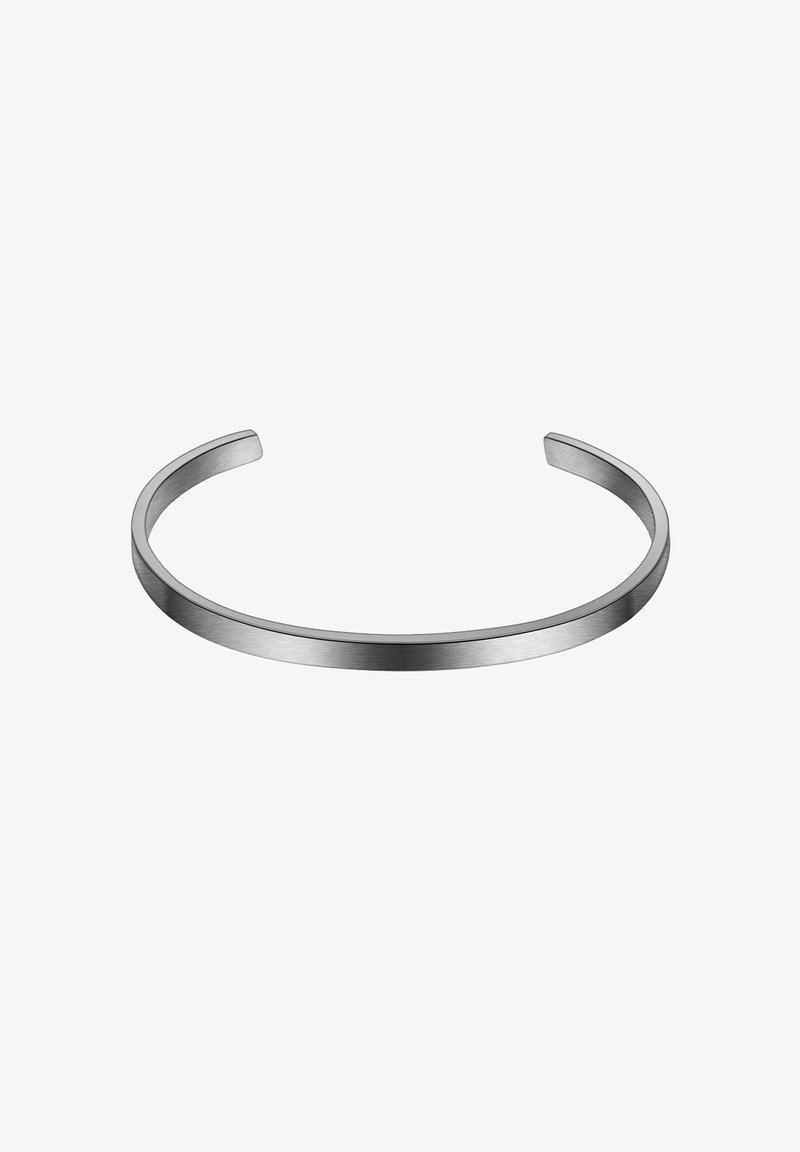 Kümmel, avatud servadega hõbedane metallist käevõru, millel on sile, harjatatud viimistlus, esitatud valge tausta ees.