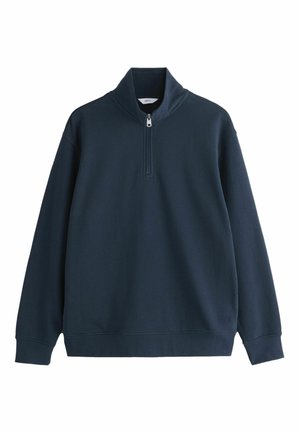 Granatowa bluza z długim rękawem, z wysokim kołnierzem i krótkim zamkiem z przodu, wykonana z gładkiej tkaniny.