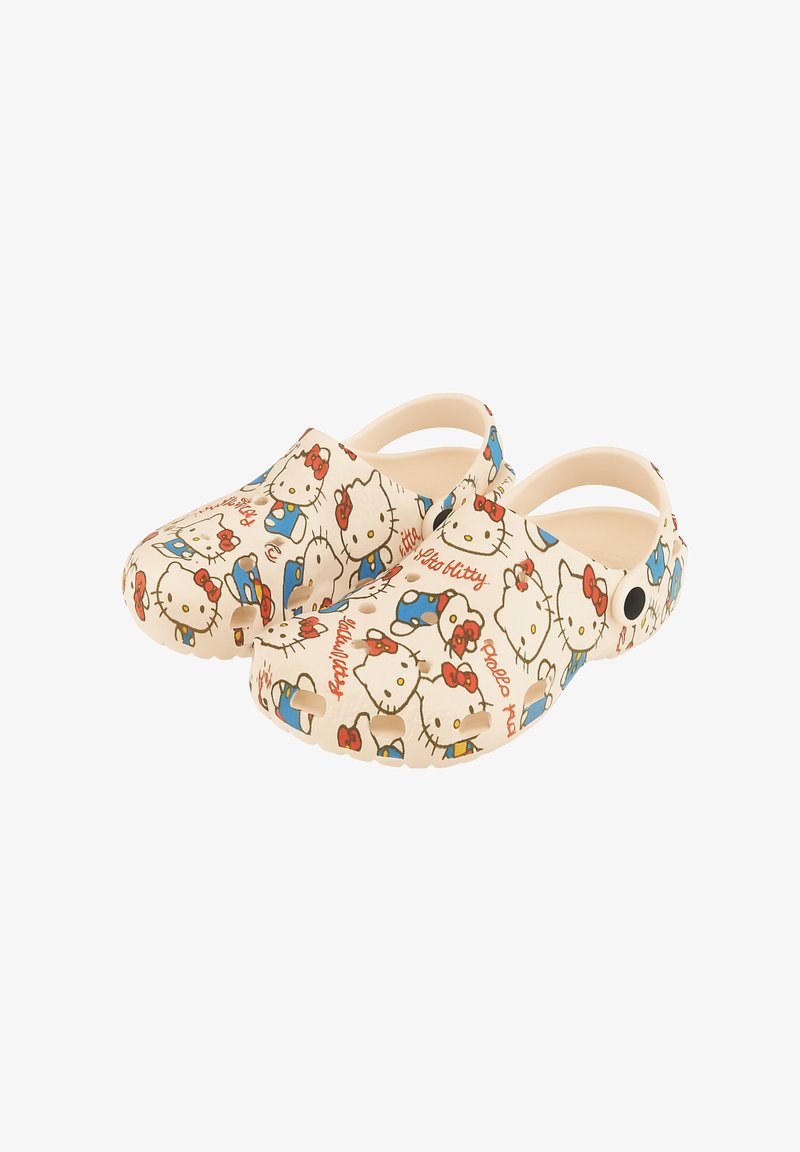 Hello Kitty clogs in beige, featuring colorful patterns of Hello Kitty characters, red bows, and blue accents. Made of lightweight material.