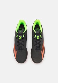 adidas Performance Jalkapallokengät kiinteälle alustalle - black