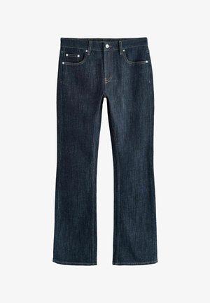 Ciemnoniebieskie jeansy z denimu o prostych nogawkach, z przodem na guziki, zamkiem błyskawicznym i fasonem z pięcioma kieszeniami ozdobionymi metalowymi nitami.