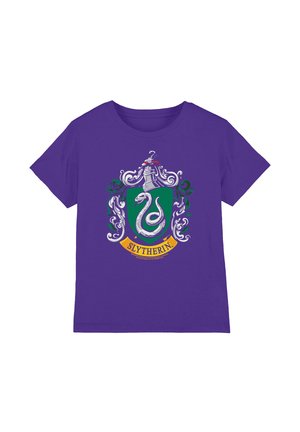 Purple short-sleeve shirt displaying Slytherin house crest with a silver snake on a green shield and decorative white and green flourishes.