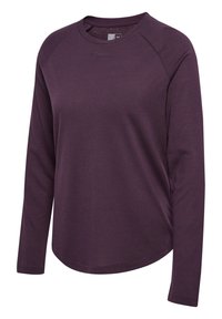 Langärmliges lila Sportoberteil mit abgerundetem Saum, strukturiertem Stoff und Raglanärmeln. Besitzt dezentes Branding am Ausschnitt.
