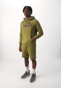 Puma SHORTS - Sportske kratke hlače - olive green