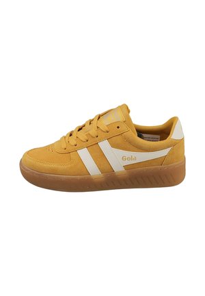 Yellow suede sneakers with white stripes, Gola branding on the side, and a gum rubber sole. Lace-up design and rounded toe.