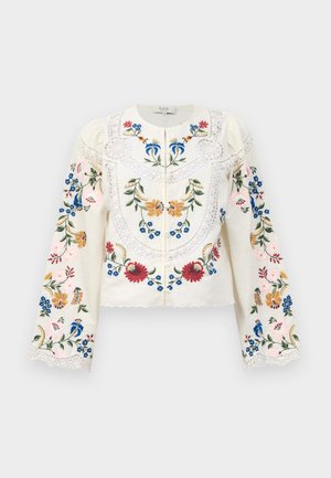 Embroidered cream blouse with long sleeves, floral patterns in pink, red, blue, and yellow, featuring lace trim and a button closure.