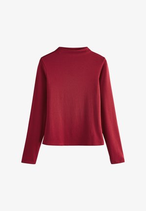 Dugih rukava, crvena majica s okruglim izrezom i glatkom teksturom. Jednostavan dizajn, bez vidljivih uzoraka ili dodataka.