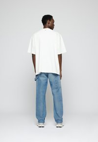 EIGHTYFIVE CARPENTER - Vaqueros estilo carpintero - light wash blue