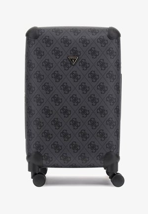 Black hard-shell suitcase with embossed logo pattern, four wheels, reinforced corners, and a logo plate on the front. Textured surface.