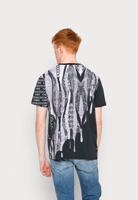 Carlo Colucci UNISEX - T-shirt estampada - black