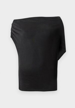 Mustassa epäsymmetrisessä paidassa on sileä, joustava kangas, jossa on keräilyyksityiskohta yhdellä sivulla. Minimalistinen muotoilu, jossa on yksi pitkä hiha.