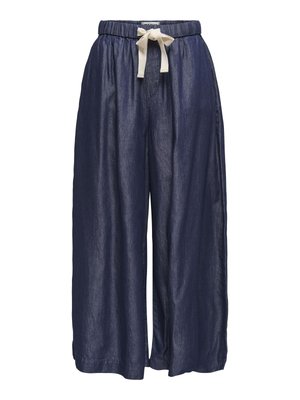 Tmavomodré nohavice širokého strihu z ľahkej látky, s elastickým pásom a krémovo sfarbeným sťahovacím šnúrkou. Minimalistický dizajn.