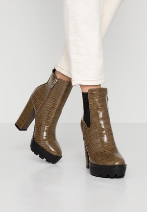 Stivaletti con tacco - beige