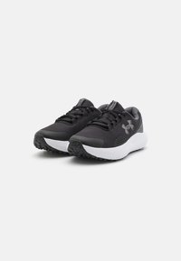 Black athletic shoes made of mesh material with a textured finish. Features a solid black body, white midsole, and black rubber outsole.