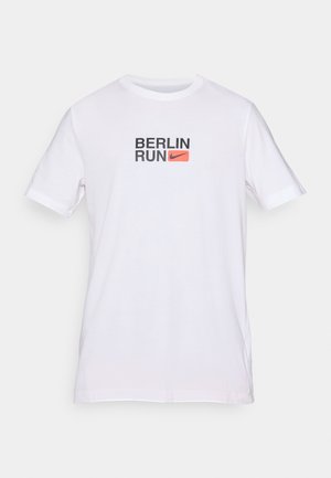 White short-sleeve T-shirt with "BERLIN RUN" text and an orange Nike logo on the chest, displayed against a plain background.
