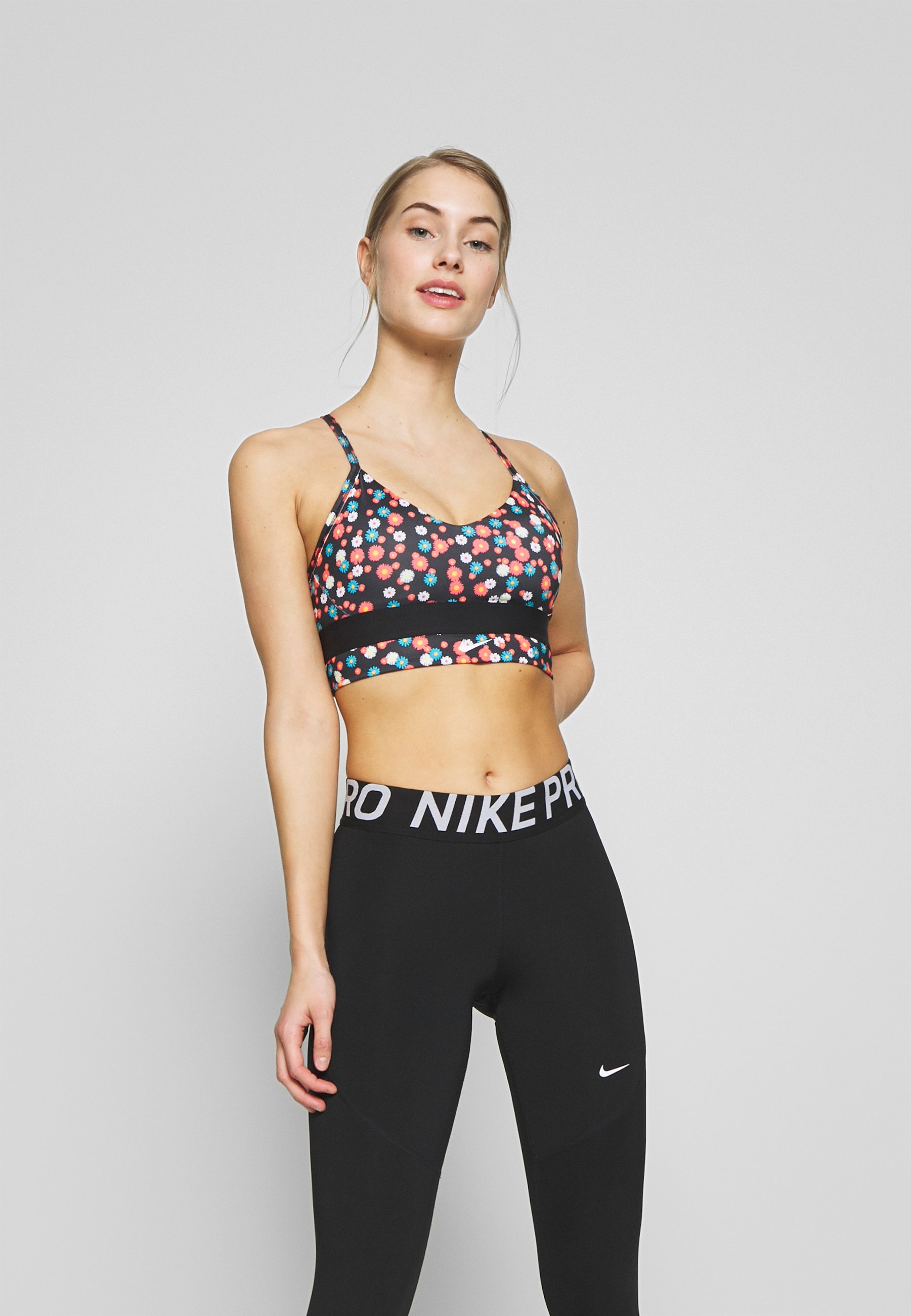 Nike Performance INDY LL PRT DAISY - Sports bra - black/white/black -  Zalando.de