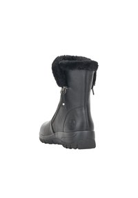 Black leather ankle boots with a faux fur cuff, zip closure, textured surface, and a sturdy rubber sole. Reinforced heel for durability.