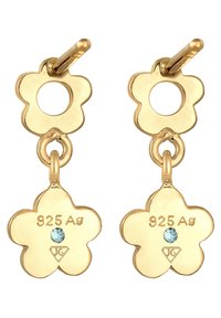 Guldblommiga örhängen med en hängande blommacharm som har en blå ädelsten och graverad "925 Ag" på båda delarna.