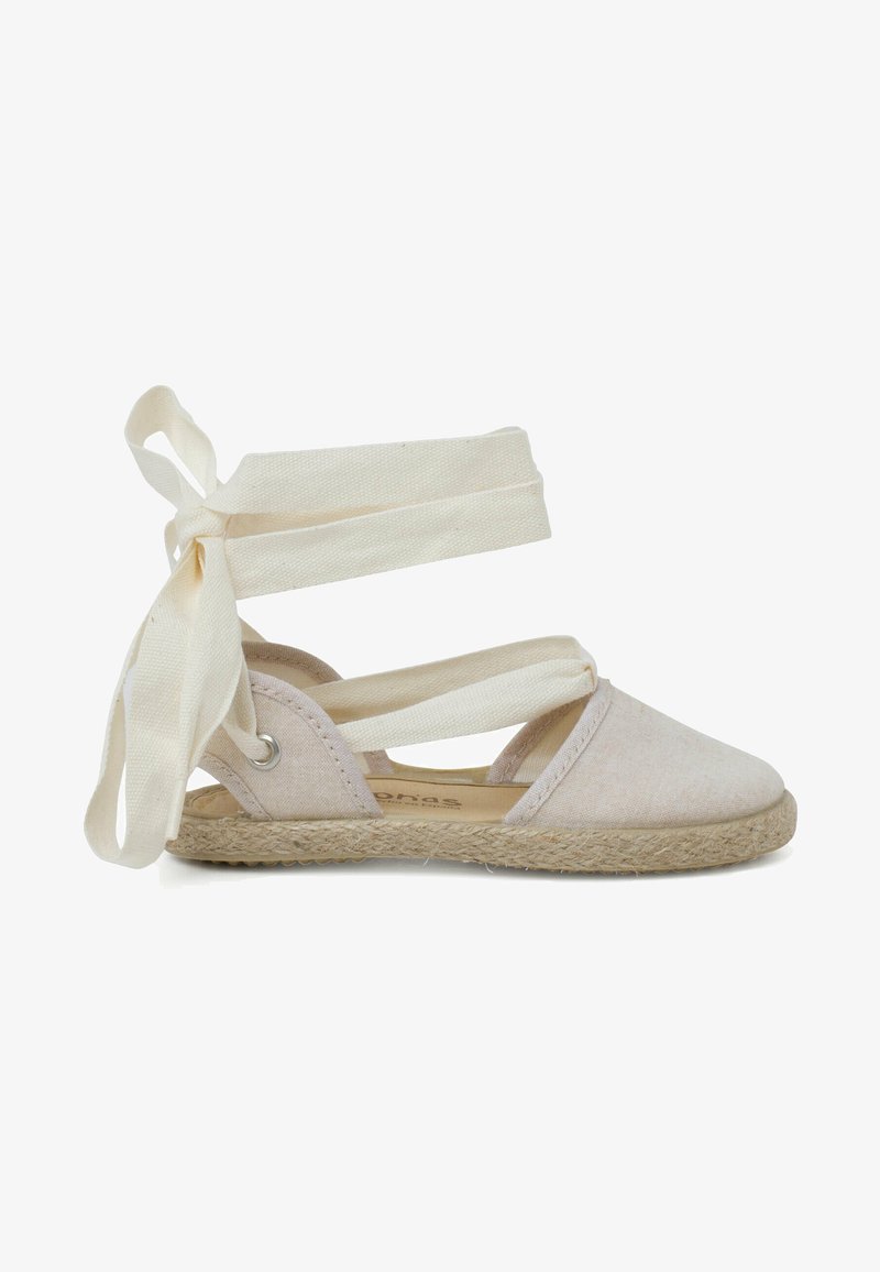 Heledad roosa kangast espadrill, millel on sääre ümber seotud kangast rihmad. Omab jute köitest talla, ümarat nina ja metallist silmuseid rihmade kinnitamiseks.