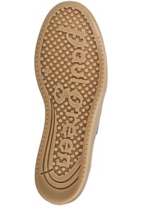 Semelle de chaussure en caoutchouc beige avec des picots ronds antidérapants et un logo "Paul Green" en relief en grandes lettres sur toute la surface inférieure.