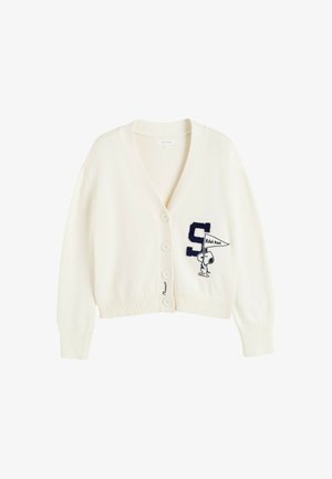 Cardigan crème avec col en V, cinq boutons et ourlet côtelé. Présente une lettre "S" brodée en bleu marine et un personnage tenant un drapeau.