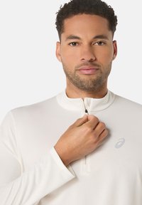 ASICS ICON 1/2 ZIP LS - T-shirt de sport - cream