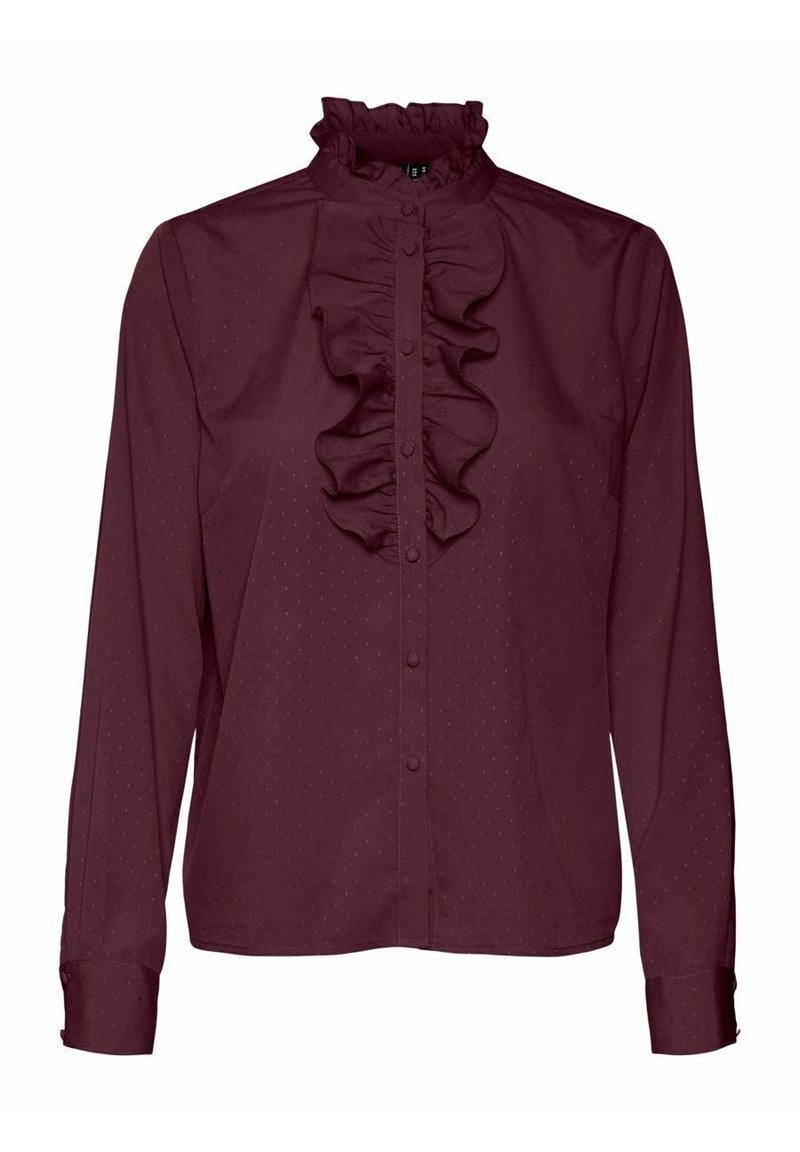 Burgundy blouse with a high ruffled collar, button-front, long sleeves, and small dot pattern throughout the fabric. Smooth texture.