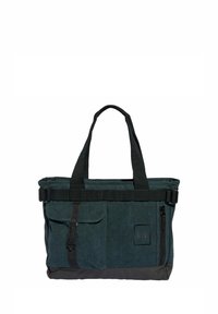 Dark green, canvas tote bag with dual handles, a black strap, front pockets, and a zipper closure; features a textured surface.